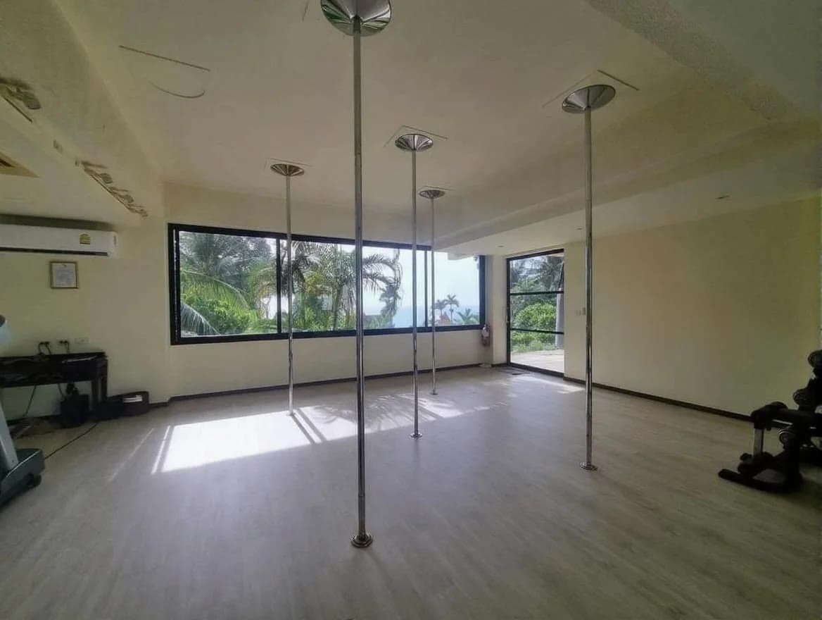 Pole studio at Ayara Kamala with floor-to-ceiling poles and sea views